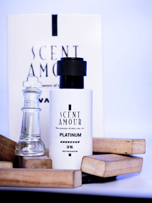 Perfume bottle labeled 'Scent Amour Platinum' with a chess piece on a light blue background