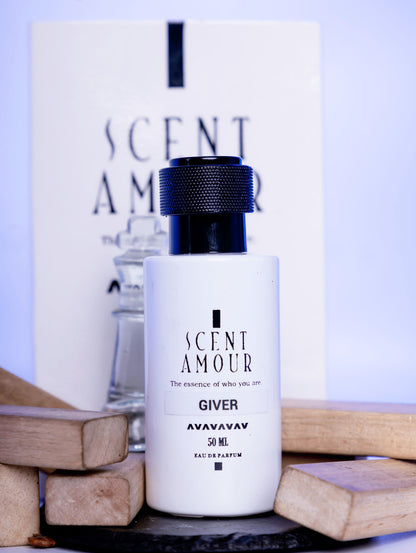 Perfume bottle labeled 'Scent Amour Giver' with a white box in the background