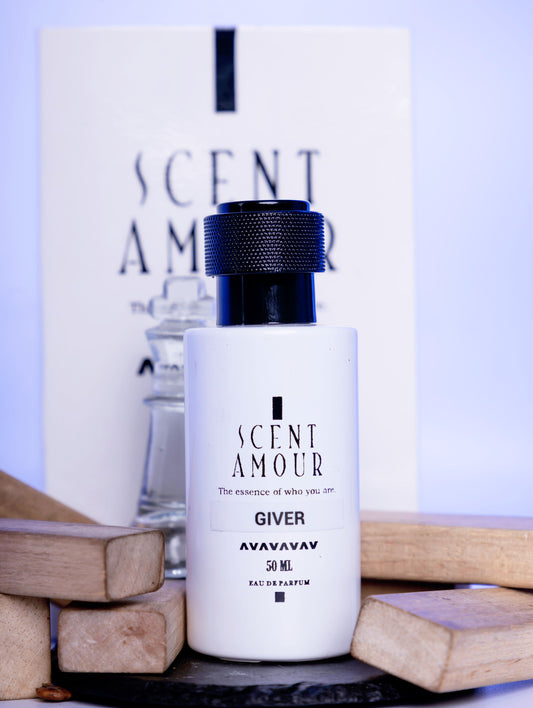 Perfume bottle labeled 'Scent Amour Giver' with a white box in the background